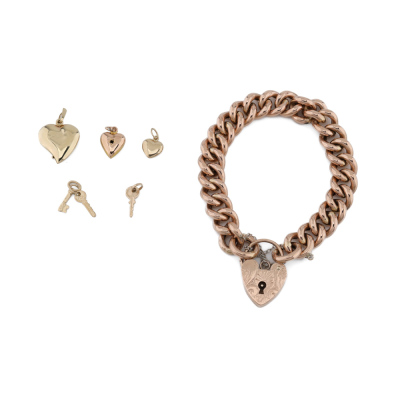 9ct Gold Curb Link Bracelet with Charms 40.2g