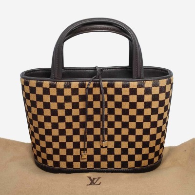 Louis Vuitton Sauvage Impala Hang bag