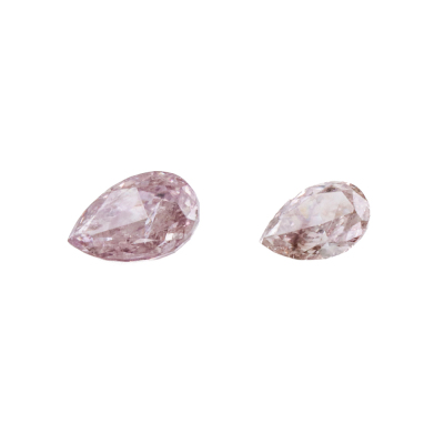 Two Pinkish Purple Diamonds totalling 0.46ct